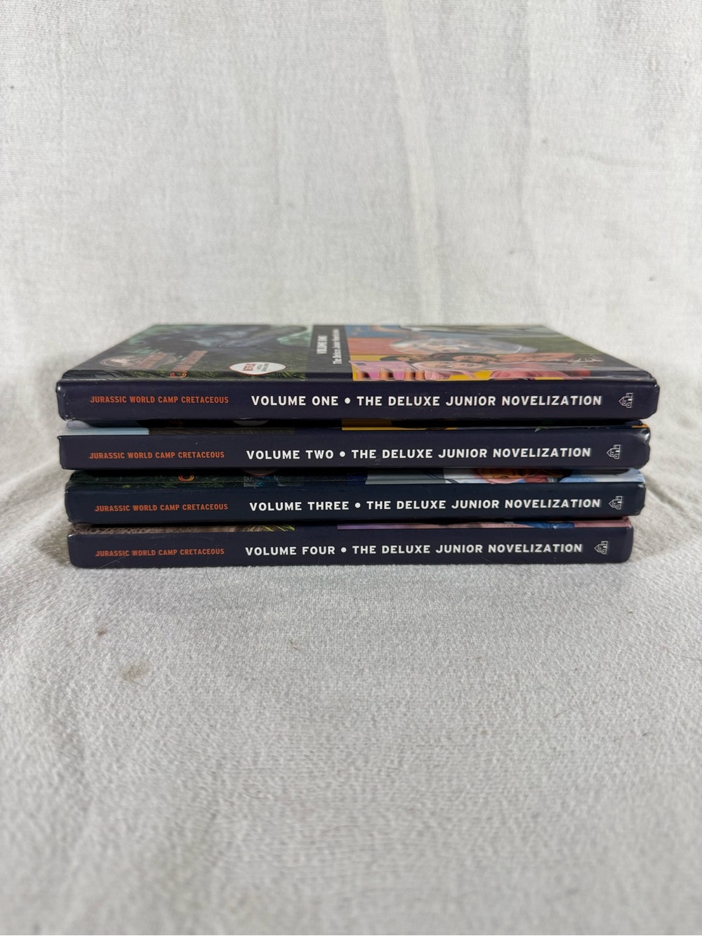 Jurassic World Camp Cretaceous Deluxe Junior Novelization Four Book Set